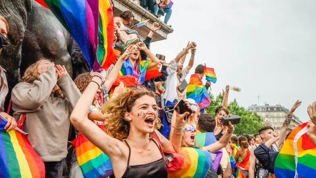 cheerful-college-students-during-a-pride-march