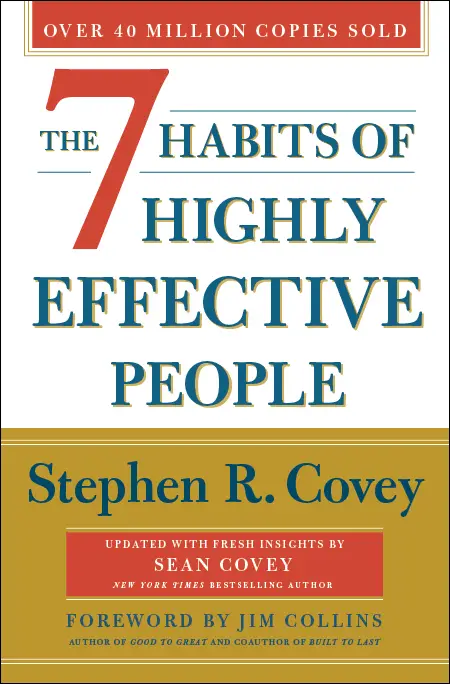A yellow and white book cover of The 7 Habits of Highly Effective People by Stephen R. Covey